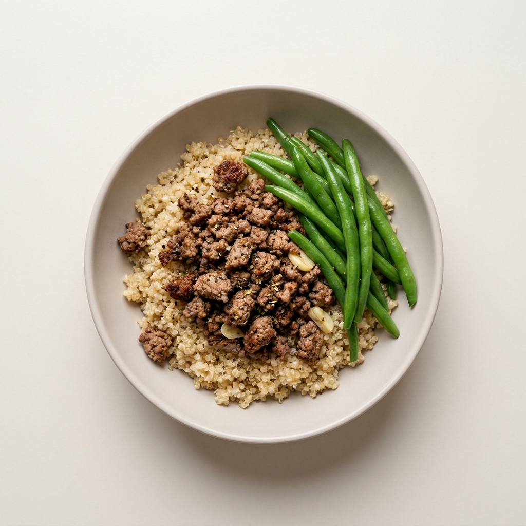 Herbed Beef and Quinoa Bowl with Green Beans, prepared as a finished Lila recipe