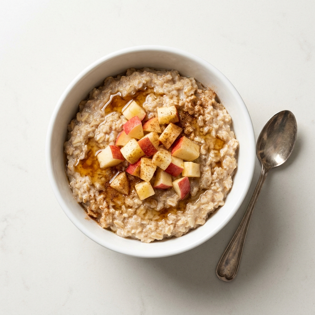 Cinnamon Apple Protein Oatmeal Bowl, prepared as a finished Lila recipe