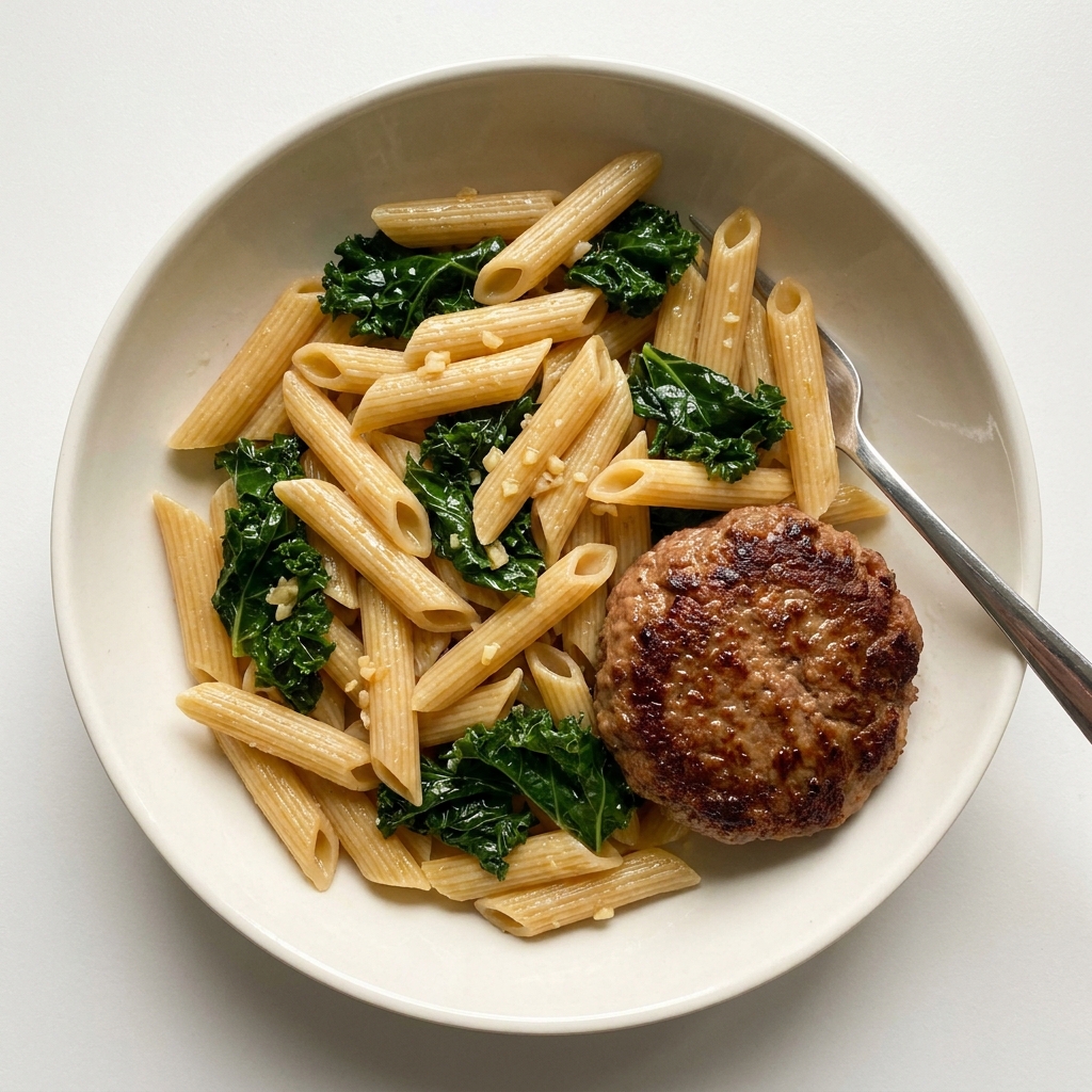 Garlic Olive Oil Brown Rice Pasta with Kale, prepared as a finished Lila recipe