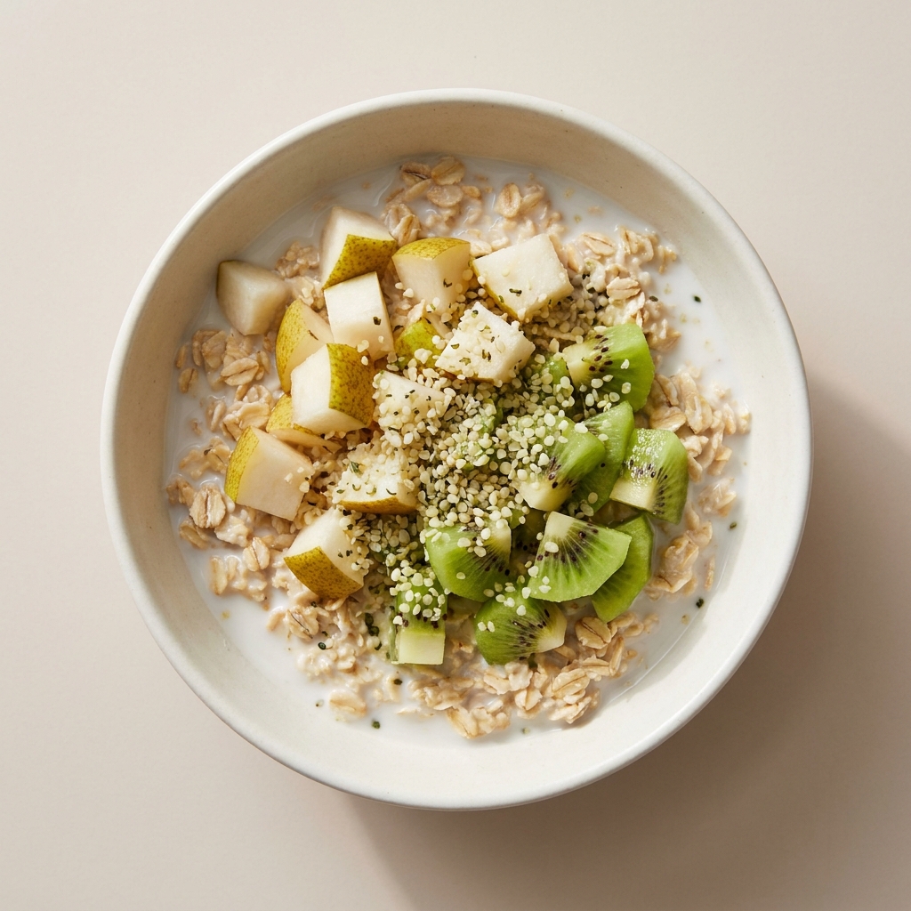 Kiwi Pear Hemp and Oat Snack Bowl, prepared as a finished Lila recipe